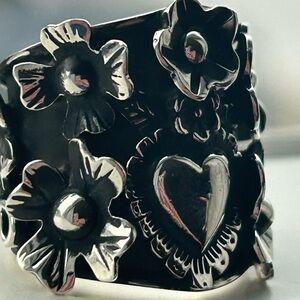 Taxco Sterling Silver Heart and Flower detail ring. Adjustable.